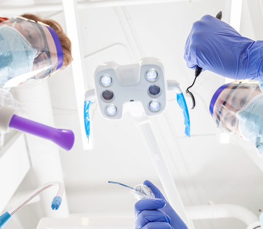 Dental clinicians working overhead view